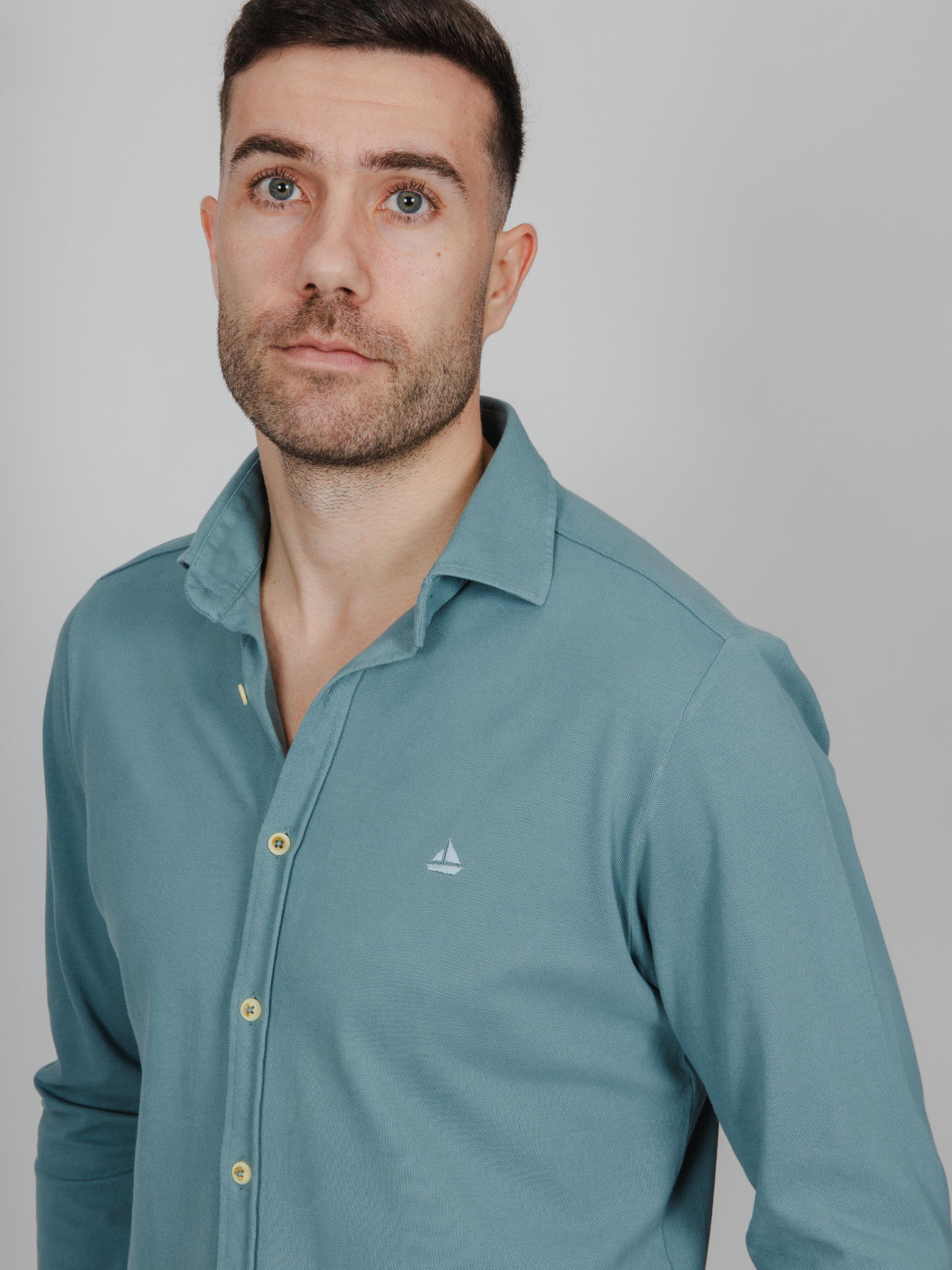 Camisa de punto turquesa