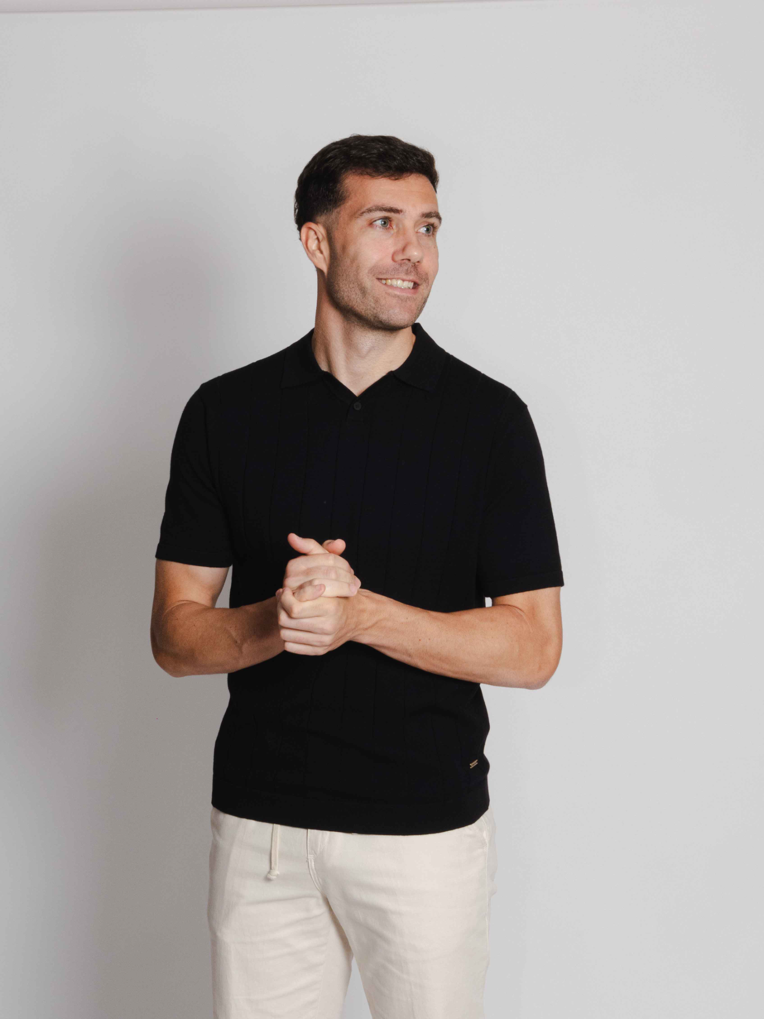 Polo punto canalé negro